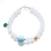 A single-loop bracelet made of white jade and Hetian jade, 999 gold coins, turquoise, meander beads, hanging dry green, and peace pendant for women Application Scenario
